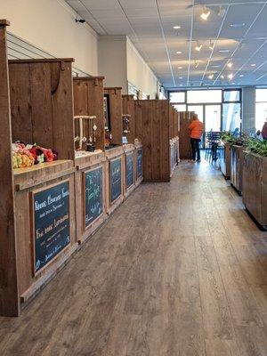 Local artists set up their work in these beautiful, rustic, barn board booths.