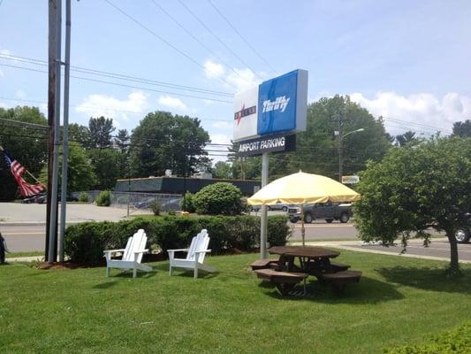 This is the waiting area out front where customers can wait while their car is getting a black tie.