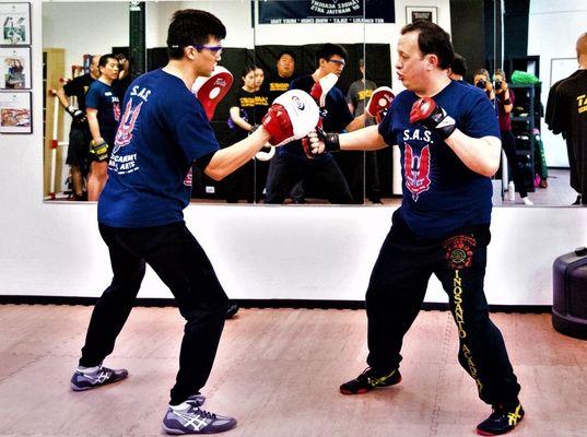 Learn Boxing for self-defense in our JKD group classes @ Tandez Academy.