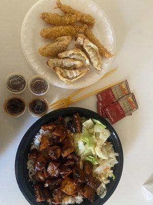 Spicy chicken, potstickers, and shrimp tempura