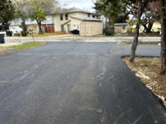 Driveway looking out to the street.