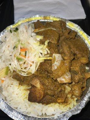 Curry goat, white rice & slaw