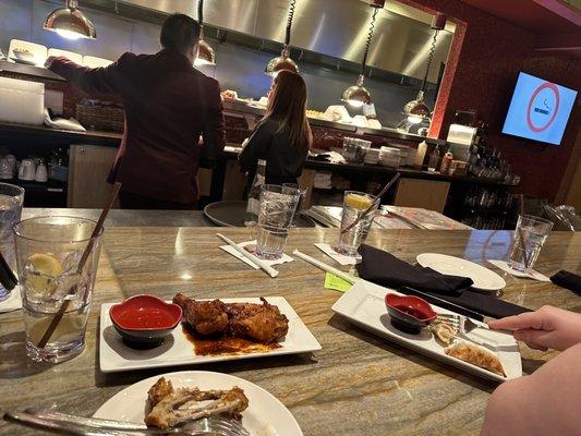 bar area. Thai wings. Potstickers.