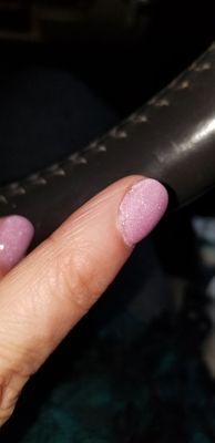 This nail is starting to chip two days after dipping. This manicure is supposed to last three to four weeks.