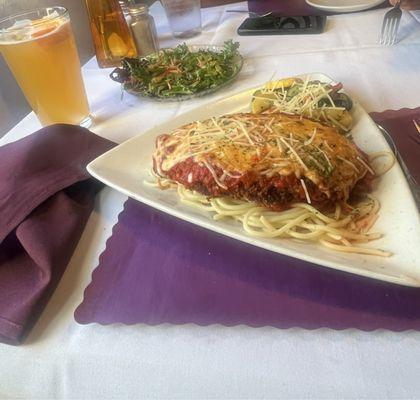 Parmesan chicken with red sauce, fresh house salad and a blue moon