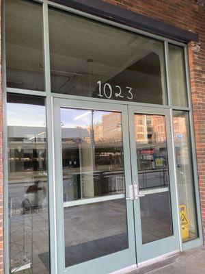 This main entrance to one of the apartment buildings. Glad someone recently wrote the address on the door.