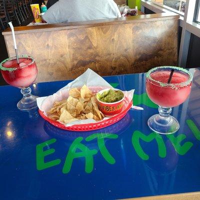 Margarita swirls with salt rim and guac and chips. Cheap and yummy!