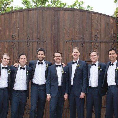 Wedding party in navy tuxedos