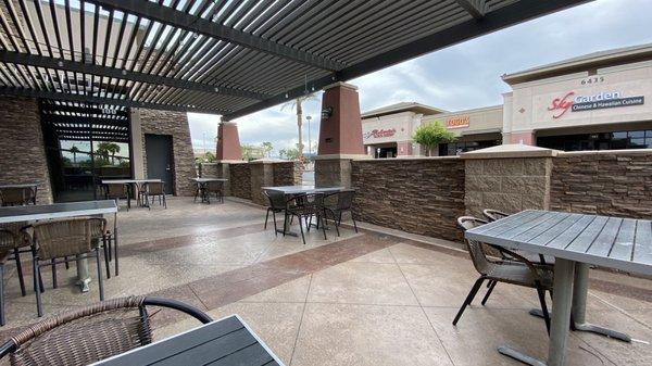 Large, empty patio at entrance to restaurant