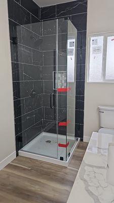 A frameless shower installed in downtown