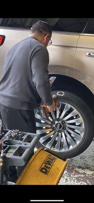 Nail being drilled in tire