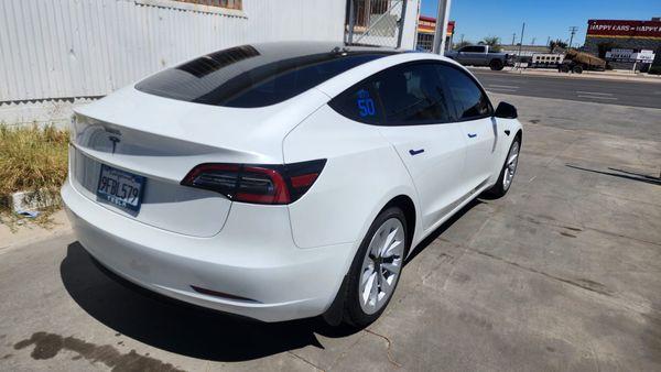 Anyone driving that Tesla? get your car tinted today at Automod Racing.