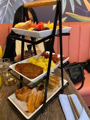 Brunch Tower $50: Fresh fruit, sausage, scrambled eggs, bacon and your pick of pancakes, waffles or French toast.