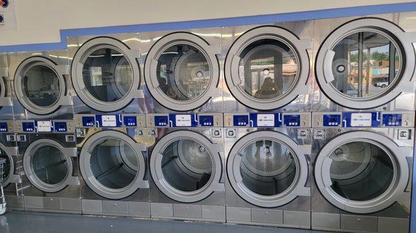 Dryers!!! A quarter gives you 7 mins of drying time. Add more quarters if you need more time. *5 mins for large dryers.