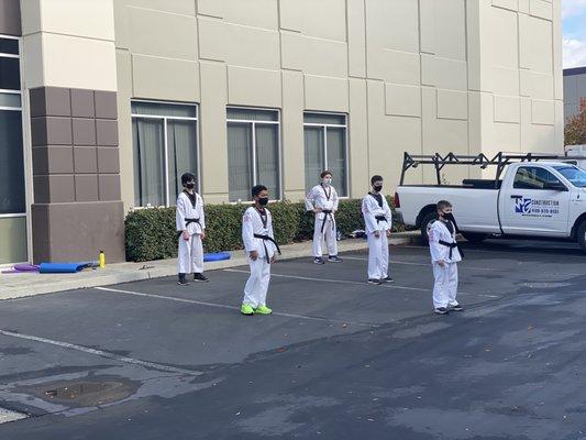 The 49th group of Black Belts practicing before receiving their Lettered Belts.