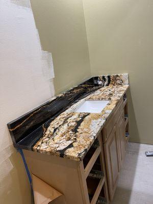 Vanity top granite
Volcano granite top 
Granite vanity with backsplash 
Granite vanity top remnant 
Granite remnant