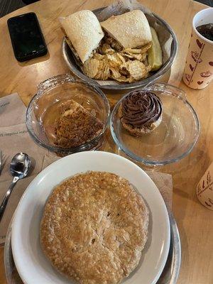 Chicken pot pie and chicken facacha with a peanut butter chocolate chip cookie cup and a slice of their Michigan ABC pie