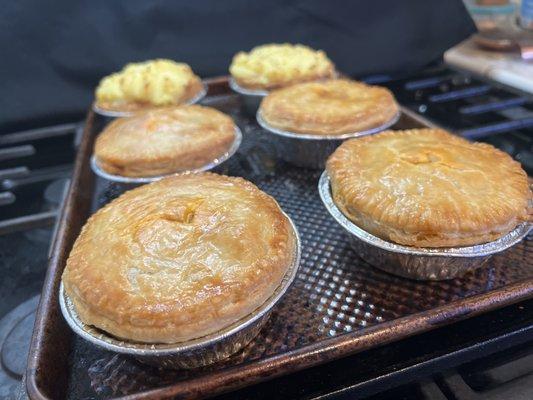 4" Birria beef pies , beef is marinated 24 hours slow cooked 8 hours, shredded and back into the sauce before being spooned into the pie