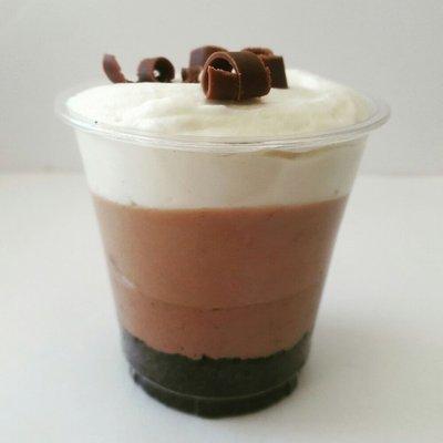 Ombre chocolate mousse cup o' pie. Layers of Oreo cookie crust, Ghirardelli chocolate mousse, and white chocolate cream cheese mousse.