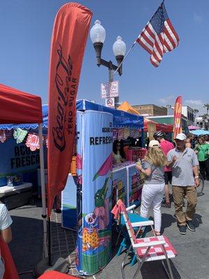 Coca Cola and Minute Maid had booths at the Hermosa Beach Pier Plaza giving out complimentary drink samples