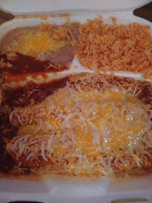 Cheese enchiladas with a side of rice and beans.