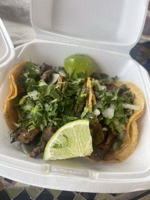 Steak tacos with cilantro and onion!