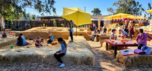 Corn kernel pit and hay maze for littles