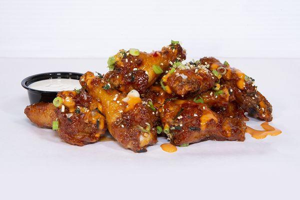 KPOP WINGS kpop honey glazed chicken wings drizzled with sriracha mayo & topped with wasabi furikake & scallions; served with miso ranch