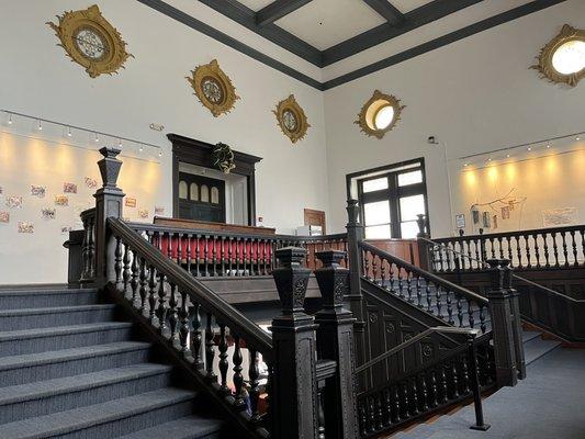 Staircase from Coat Check to the theatre.