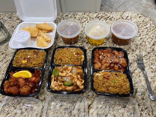 Left to right: Orange chicken, Kung poh chicken, sesame chicken. Crab Rangoon's, hot and sour soup and wonton soup.