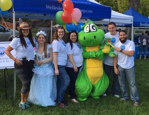 The team at Wellesley Wonderful Weekend featuring our own tooth fairy and dinosaur mascot Christopher