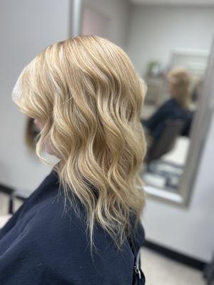 Soft blonde babylights for this beauty. 
Layer haircut with texture 
Blowout Curled and styled.