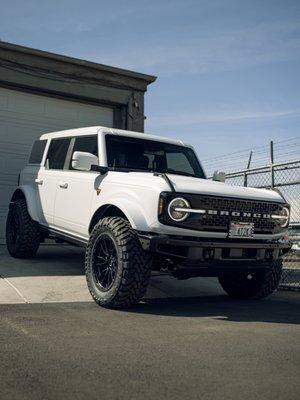 This 2021 Ford Bronco Badlands in Matte White with the Full Body Paint Protection Pacakge