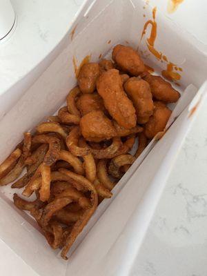 9 piece boneless Buffalo wings with curly fries