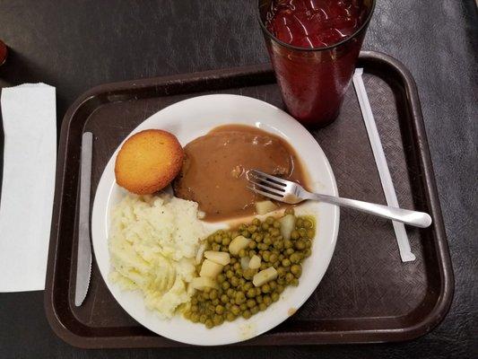 My meal is Salisbury Steak, sweet peas and mashed potatoes.