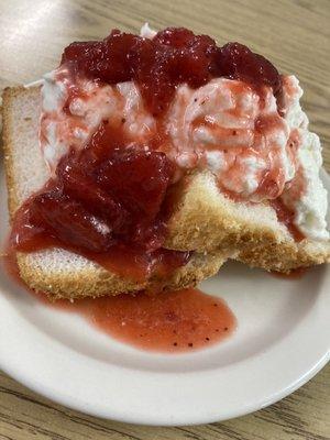 Angel food cake with strawberries and home made whipped cream