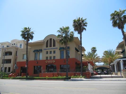 Located at the corner of Torrance Blvd and Cabrillo Avenue, above Buffalo Fire Department.