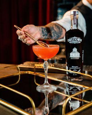 The Fritz 75 - A classic Salvation Spirits cocktail made with our Blackberry Fritztown Gin!