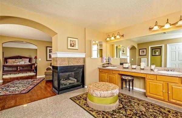 Luxuriate in this sumptuous 5 piece Master Bath suite-embellished with granite and stone and a large walk-in closet.