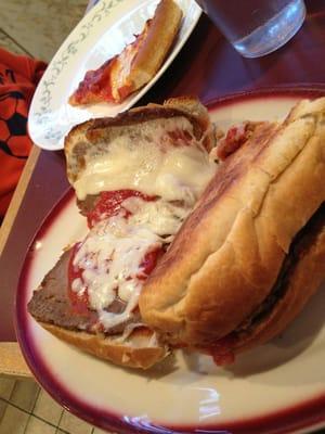 "Meatball grinder". Looked like freezer burnt meatloaf.