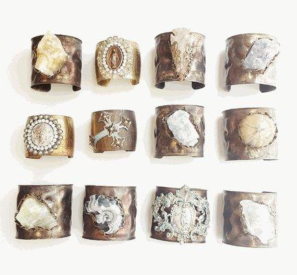 Cuffs and bracelets made with natural stones and fossils.