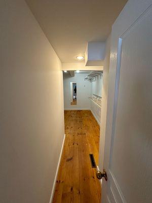 Hallway to walk in closet