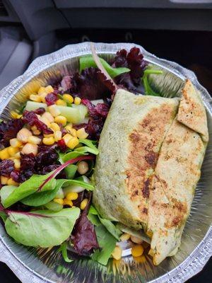 Spinach wrap with egg and avocado, side salad