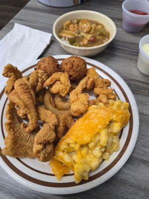 Fried catfish, macaroni and cheese, fried shrimp, and seafood gumbo