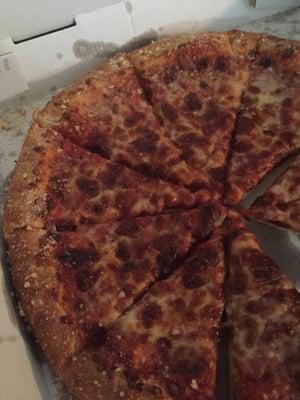 Burned cheese pizza