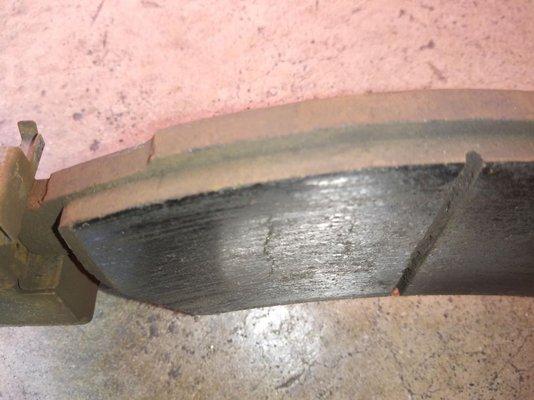 The line on the brake pad is where it was causing damage to the brake pad. It is not supposed to have that deep line