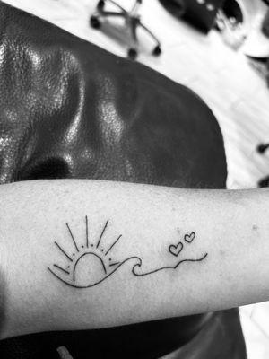 Alex added the sun and hearts to my existing wave.   I love it and it means so much more to me because he drew it.