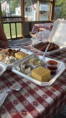 Pulled Pork, Full Rack of Ribs, Cornbread, Slaw, and Potato Salad.