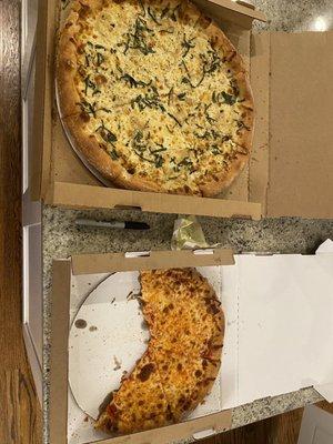 Sharpie in there for scale. 16" Rose on the top, 12" cheese on the bottom (minus two slices).