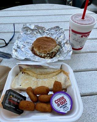 My combo , BBQ Sandwich with Slaw and Hot Sauce , Chicken Quesadilla , Hush Puppies , and Cheerwine Float